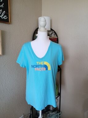The North Face Women’s V-Neck Tee in Aqua with Multicolor Logo